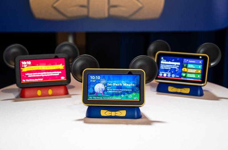 Three Hey Disney devices displaying different in-room experiences